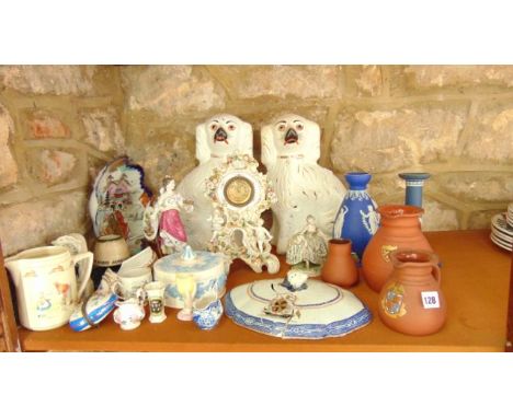 A collection of mainly 19th century ceramics including a figure of a lady in 18th century style costume with painted Sevres s