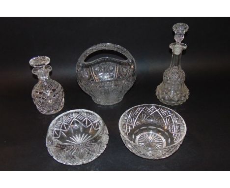 A Stuart cut glass decanter, a substantial clear cut glass dish of basket form, a further decanter and two clear cut glass bo