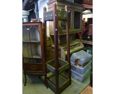 A mahogany coat and stick stand of square cut tapering form of full height with wicker banded panels