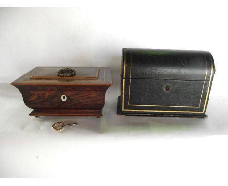 A 19th century rose wood veneered casket of sarcophagus form raised on four brass mushroom shaped supports with inlaid detail