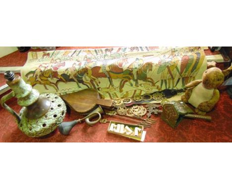 A large German ceramic table lamp, bellows, bookends, horse brasses, leather rabbit, Bayeux tapestry panel, etc