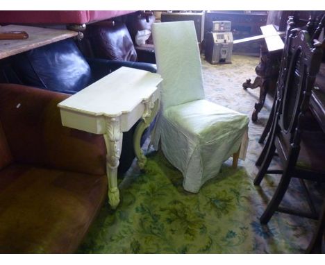 A painted console table on cabriole forelegs and a side chair with loose covers, a print of a Beefeater, and four bentwood ch