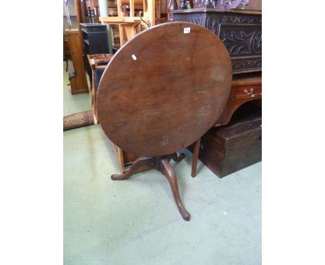 A 19th century mahogany snap top table on turned pillar and tripod