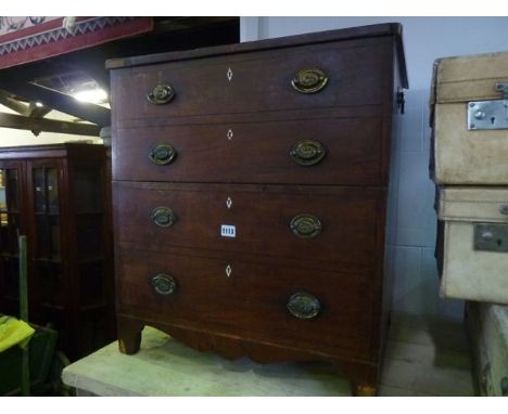 An early 19th century mahogany chest commode, the front elevation disguised by four simulated drawers, with original embossed
