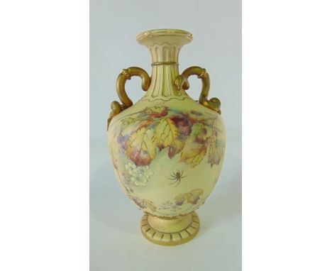 A Royal Worcester ivory ground two handled vase with painted and gilded bramble and blackberry decoration, with gilded spider