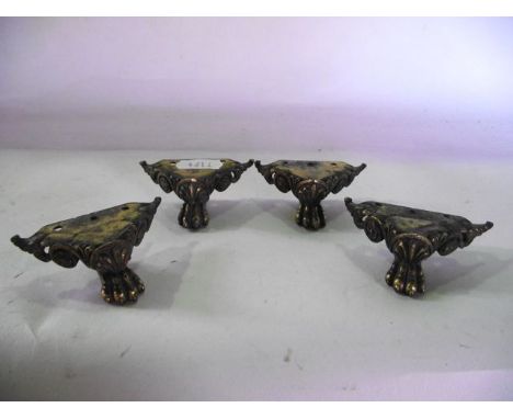 Four good quality 19th century cast brass paw feet, from a caddy or similar product