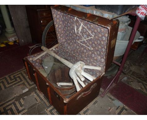 A vintage fibre trunk containing an oak and banded bucket, Edwardian tin bed pan with painted finish, washing dolly, sewing m