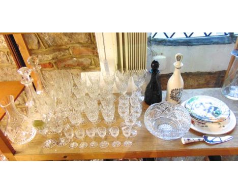 A good collection of quality clear cut drinking glasses to include nine large and ten smaller wine glasses with vertical cut 