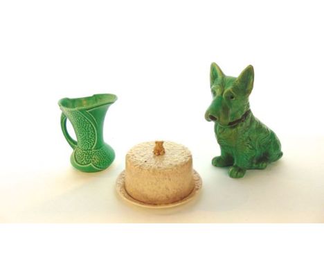 A Sylvac green glazed model of a seated Scottie dog with impressed numbers to base 1258 (?) and 77850 together with a Sylvac 