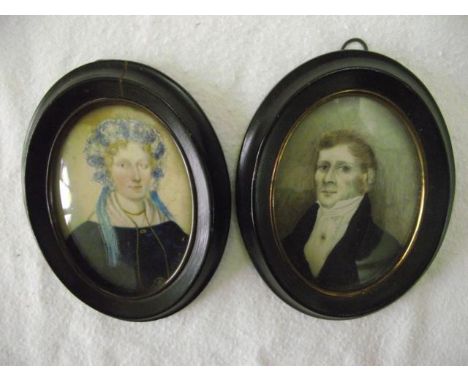 Two 19th century portrait miniatures of oval form, probably a pair, showing a bust length portrait of a lady and a gentleman,