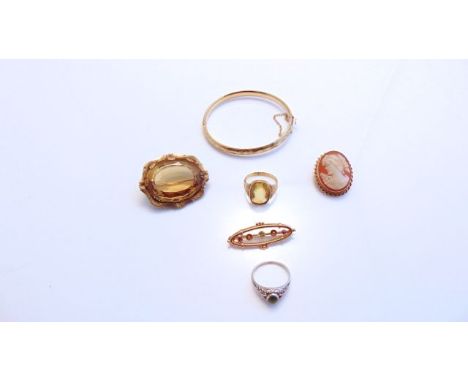 A 9ct gold hinged bangle, 6.8g; a 9ct gold paste-set brooch, of oval form; an untested citrine ring, in unmarked gold; a came
