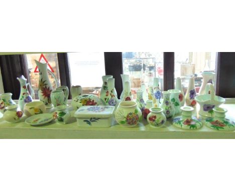 A quantity of E Radford ceramics in various patterns including a pair of anemone candlesticks, an anemone basket, three anemo