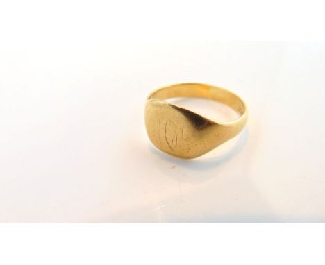 An 18ct gold signet ring, monogram worn, size R, 6.2g
