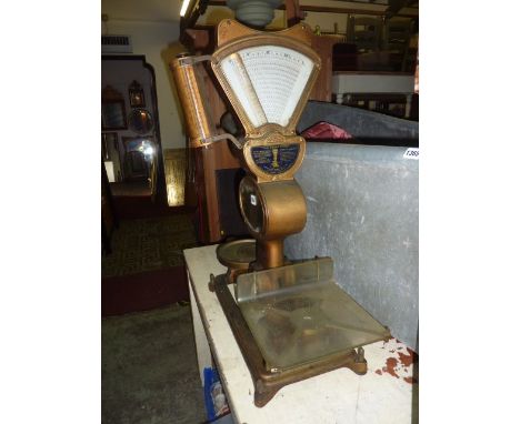 A vintage shop balance scales by the Automatic Scale Company, patent number 202481 to weigh increments to one half once, with