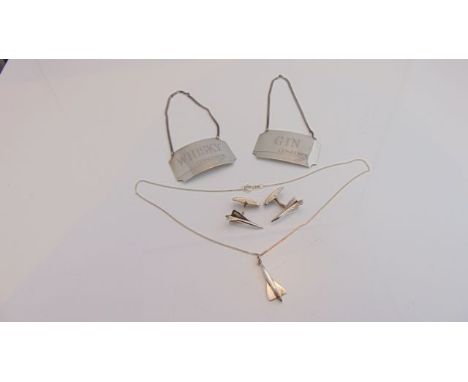 A pair of silver Concorde decanter labels, Birmingham, 1986, for "Gin" and "Whisky", 29.4g in total; a pair of sterling silve