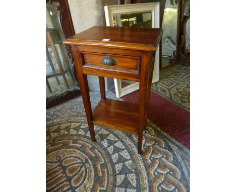 A hardwood side table with single drawer