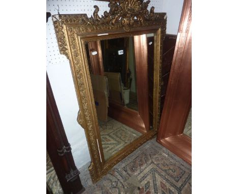 A 19th century gilded wall mirror of rectangular form with moulded detailed framework, 120 cm max x 80 width, and a small two