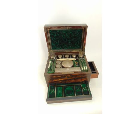 An assembled Victorian silver-mounted travelling toilet set, James Vickery & Thomas Whitehouse, London, 1864 & 1874, with eng
