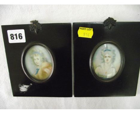 A pair of portrait miniatures showing bust length studies of oval form of ladies, one in fur collar and blue headband the oth