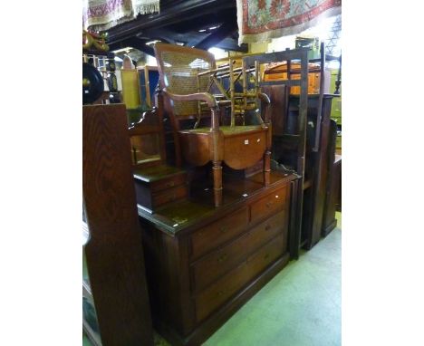 A 19th century bamboo two divisional Canterbury together with a 19th century commode elbow chair with cane panelled seat with