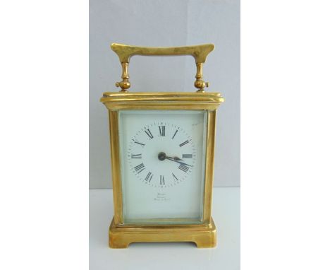 A simple French carriage clock retailed by Maine of Jersey with 8-day movement