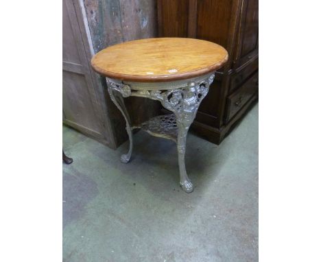 A Victorian cast iron Britannia head pub table with later oak top