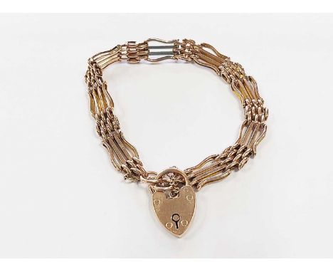 A rose metal four bar gate link bracelet, the heart shaped padlock clasp stamped ‘E J R 9ct’, weight approx 17.7g