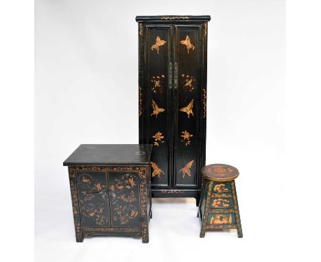 Three Chinese lacquer cabinets, late 20th century, the first of rectangular outline with twin doors opening to three removabl