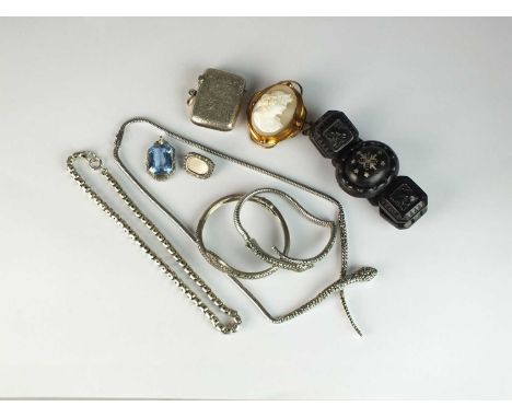 A collection of costume jewellery, to include; two marcasite set snake bangles, a marcasite snake necklace, a carved jet pane