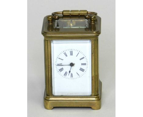 An early 20th century miniature carriage timepiece, obis case and with a 1.75” enamelled dial, an 8-day lever movement, back-