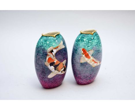 A pair of limited edition Carlton Ware vaseslate 20th/early 21st centuryhand-painted with Koi fish by Peter Graves, limited e