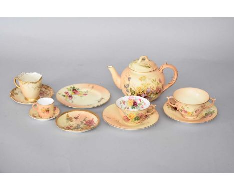 A group of Royal Worcester blush ivory cups and saucers and a teapot and coverlate 19th/early 20th centurycomprising an Empre