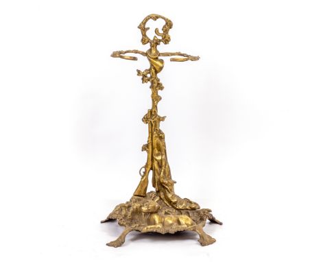 A BRASS STICK STAND/UMBRELLA STAND with hunting theme, 56cm high