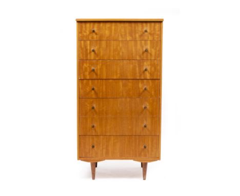 A LATE 20TH CENTURY TEAK CHEST  of seven drawers with turned brass handles 65.5cm wide x 47cm deep x 124.5cm high 