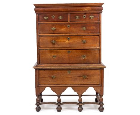 AN 18TH CENTURY, POSSIBLY COLONIAL WALNUT CHEST ON STAND the upper section with a frieze drawer over two short and three long