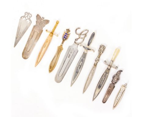 AN M BROS 9 CARAT GOLD BOOKMARK in the form of a sword, 9cm long; a silver gilt and enamel bookmark and eight further silver 