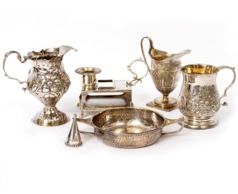 A GEORGE III SILVER CHRISTENING MUG with chased and engraved decoration and a gilt lining, 8cm high; a Georgian silver cream 