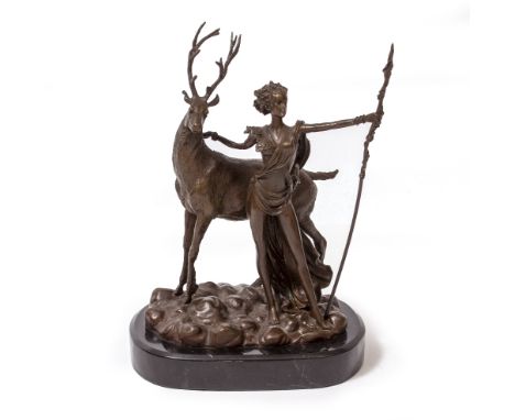 AFTER RANCOULET a bronze figure of Diana the Huntress and a stag, the naturalistic base stamped 'Rancoulet', on a rounded pli