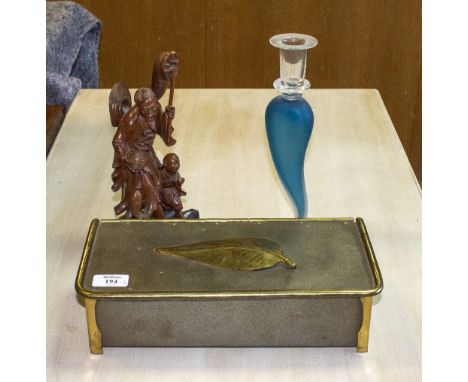 A CARVED WOODEN CHINESE FIGURE  of a fisherman 27cm in height, a Toleware box 33cm wide and a glass candlestick (3)