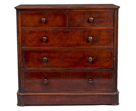 A VICTORIAN MAHOGANY CHEST OF TWO SHORT AND THREE LONG DRAWERS with turned knob handles and a plinth base, 122cm wide x 54cm 