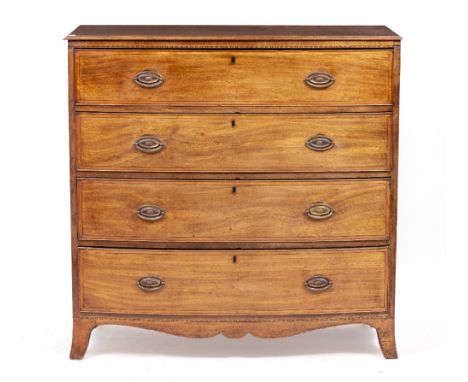 A 19TH CENTURY MAHOGANY BOW FRONT CHEST OF FOUR LONG DRAWERS with brass handles and splayed bracket feet, 109cm wide x 48cm d