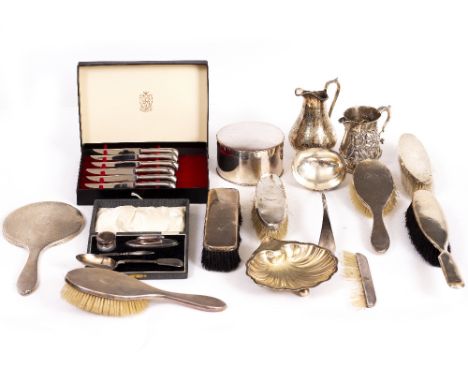 A COLLECTION OF SILVER  to include silver backed brushes, a dressing table set, a silver plated circular biscuit box, a silve