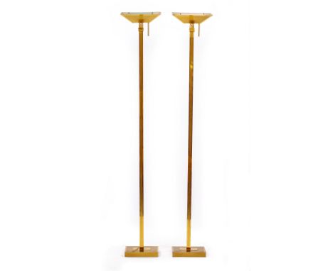 A PAIR OF BRASS FLOOR STANDING UPLIGHTERS the shades 30cm wide and the light standing 185cm high overall (2)
