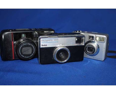 LOT OF VINTAGE CAMERASincluding Kodak Instamatic 133X, Nikon TWZOOM, Hanimex 35 HF Motor, etc 