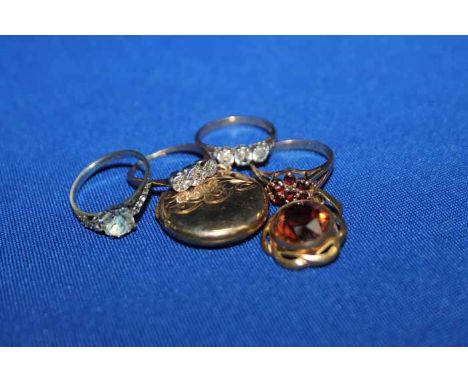 THREE GOLD GEM SET RINGSalong with another white metal ring; along with two plated gold pendants