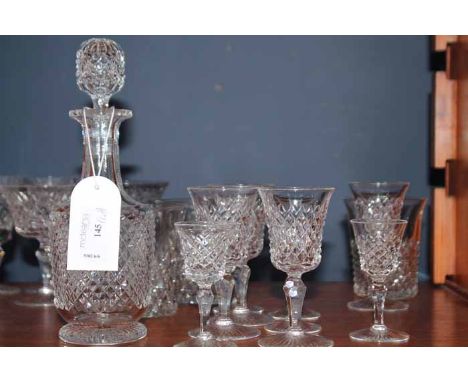 LOT OF CRYSTAL AND GLASSincluding four decanters, tumbler, wine glasses etc; together with a part suite of diamond cut glasse