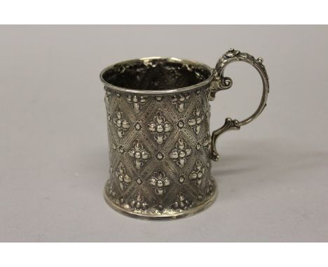 A VICTORIAN CHRISTENING MUG with repousse decoration Sheffield 1865 Maker: Henry Wilkinson &amp; Co.