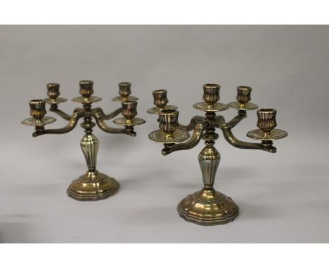 A PAIR OF ST MEDARD PARIS FIVE LIGHT CANDELABRA with four scrolling branches 10ins high.