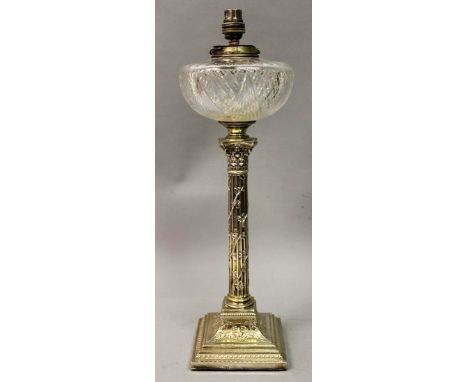 A SILVER OIL LAMP as a Corinthian column, with glass reservoir and stepped base Sheffield 20ins high.