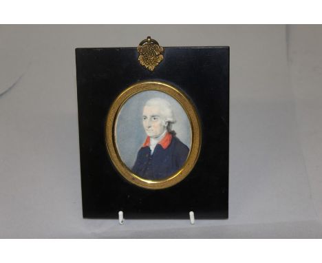 EARLY GEORGIAN Portrait, half length of a gentleman in a blue coat with red collar. 7.5cms x 6cms.